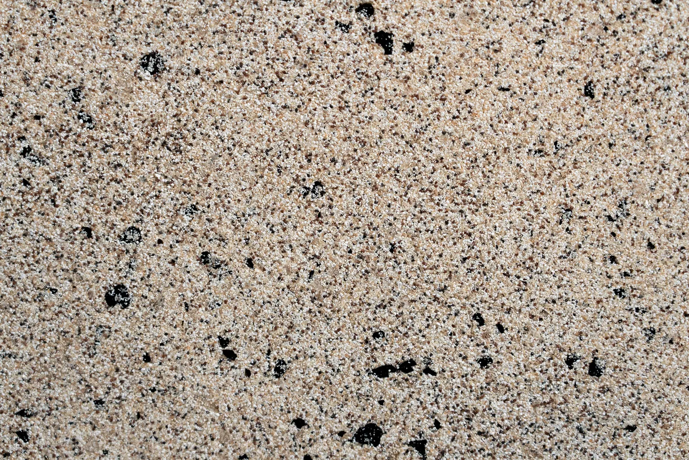 Powierzchnia tynku, tynk wielobarwny StoSuperlit® K 0,8 w kolorze beżowym